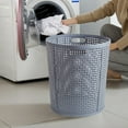 thumbnail image 1 of YIMWNYI Household Plastic Clothes Storage Basket, Durable Laundry Hamper with Handles for Easy Transport, Hollow Design for Ventilation, Smooth Finish to Prevent Damage, Ideal for Organizing Clothes, 1 of 6