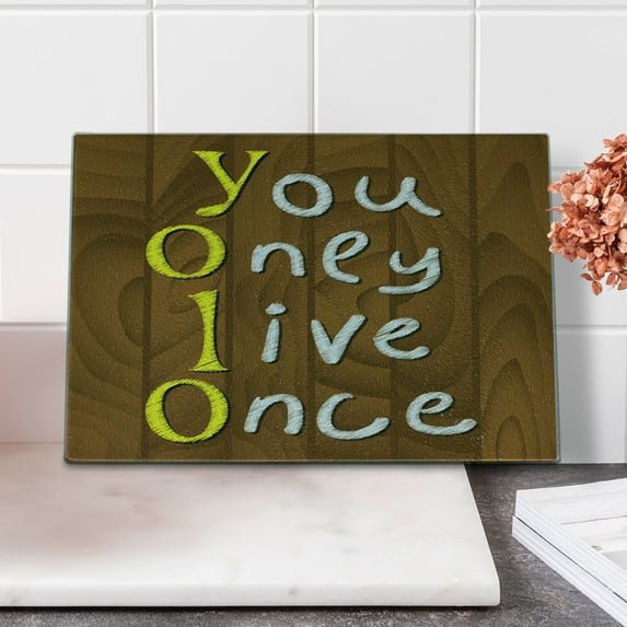 YOLO Cutting Board, Cartoon Style Wooden Rustic Background with Meaningful Gripping Slogan, Decorative Tempered Glass Cutting and Serving Board, Small Size, Brown Yellow and White, by Ambesonne