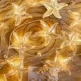 thumbnail image 1 of YUNOVA 9.84FT Battery Powered Shell String Lights - 20 LED Starfish & Seashell Fairy Lights, Ocean Theme Decor for Bedroom, Wedding, Garden Party, Beach Holiday Decorations, 1 of 8