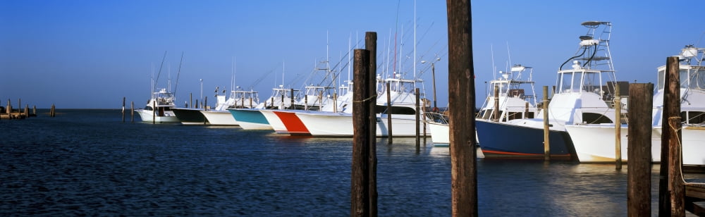 Yacht Charter boats at a harbor Oregon Inlet Outer Banks North Carolina USA Canvas Art - Panoramic Images (27 x 9)