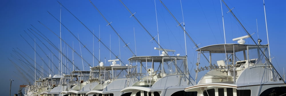 Yacht Charter boats at a harbor Oregon Inlet Outer Banks North Carolina USA Canvas Art - Panoramic Images (36 x 12)