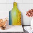 thumbnail image 1 of Yellow and Blue Cutting Board, Sunset over Harvest Wheat Nature Rural Field Autumn Landscape, Tempered Glass Cutting and Serving Board, Wine Bottle Shape, Earth Yellow Petrol Blue, by Ambesonne, 1 of 1