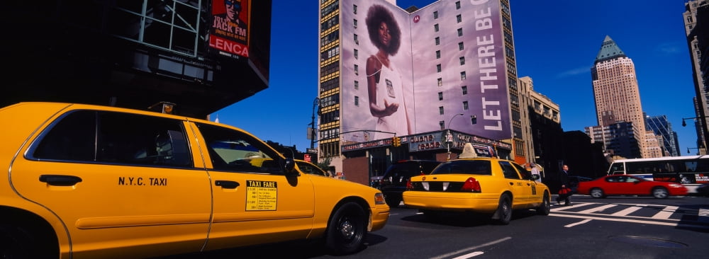 Yellow taxies at the road intersection Manhattan New York City New York State USA Canvas Art - Panoramic Images (36 x 12)