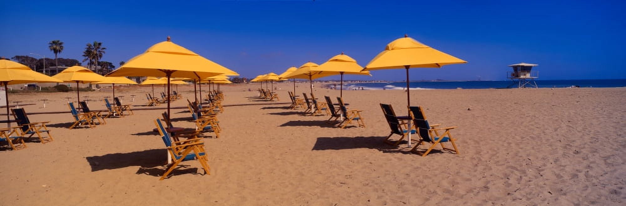 Yellow umbrellas and beach chairs on Ventura beach California Canvas Art - Panoramic Images (27 x 9)