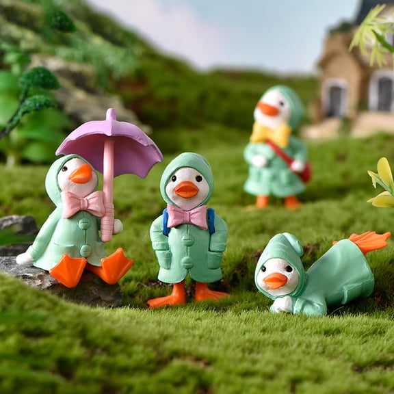 Yinreli 4Pcs/Set Animated Ducks Figurines Cartoon Plastic Exquisite Decorative Ducks Statue for Kids