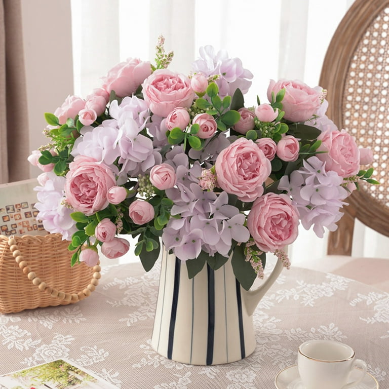 Beautiful Dried Hydrangeas In Big Transparent Glass Vase On Pink