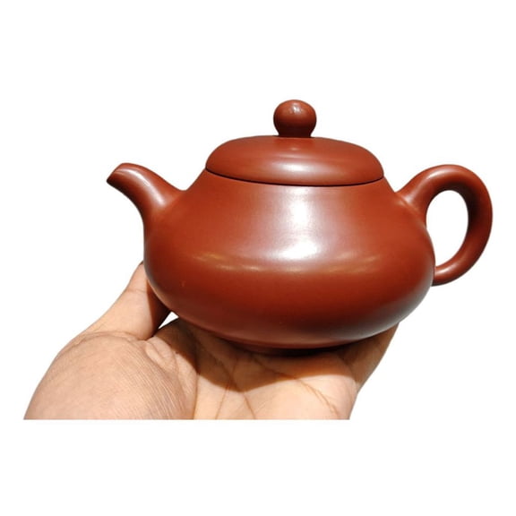 Yixing Purple Teapot Kettle Ceramic Handcrafted Sculpted Artisan Made Smooth Textured Sleek Lined Traditional Bulbous Creamy