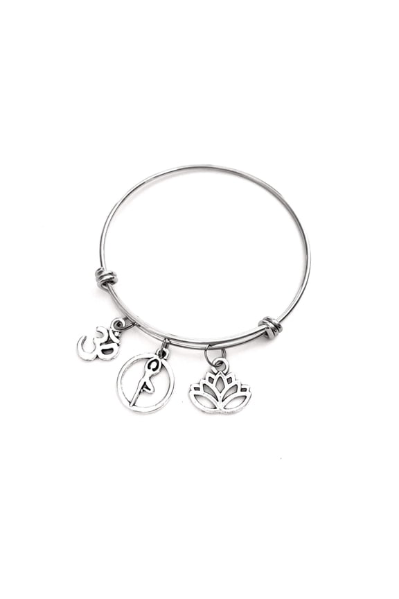 Yoga themed bracelet. Includes Ohm symbol, Lotus Flower, and I Love Yoga Charms. Yoga Teacher gift.