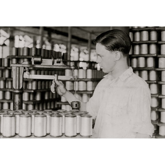 Young Boy Weighs Spools of Silk Thread Poster Print (18 x 24)