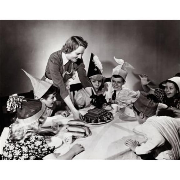 Young Woman Serving Hot Dogs to Children at a Party Poster Print - 18 x 24 in.