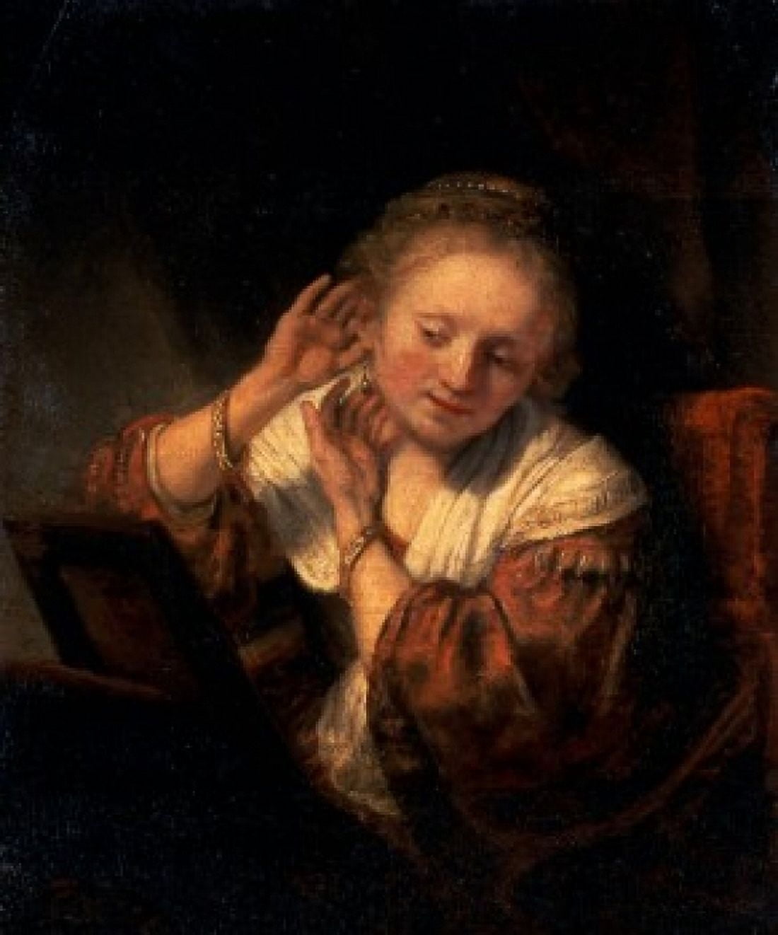 Young Woman Trying on Earrings Rembrandt Harmensz van Rijn (1606-1669 Dutch) Hermitage Museum St Petersburg Russia Canvas Art - Rembrandt Harmensz van Rijn (24 x 36)