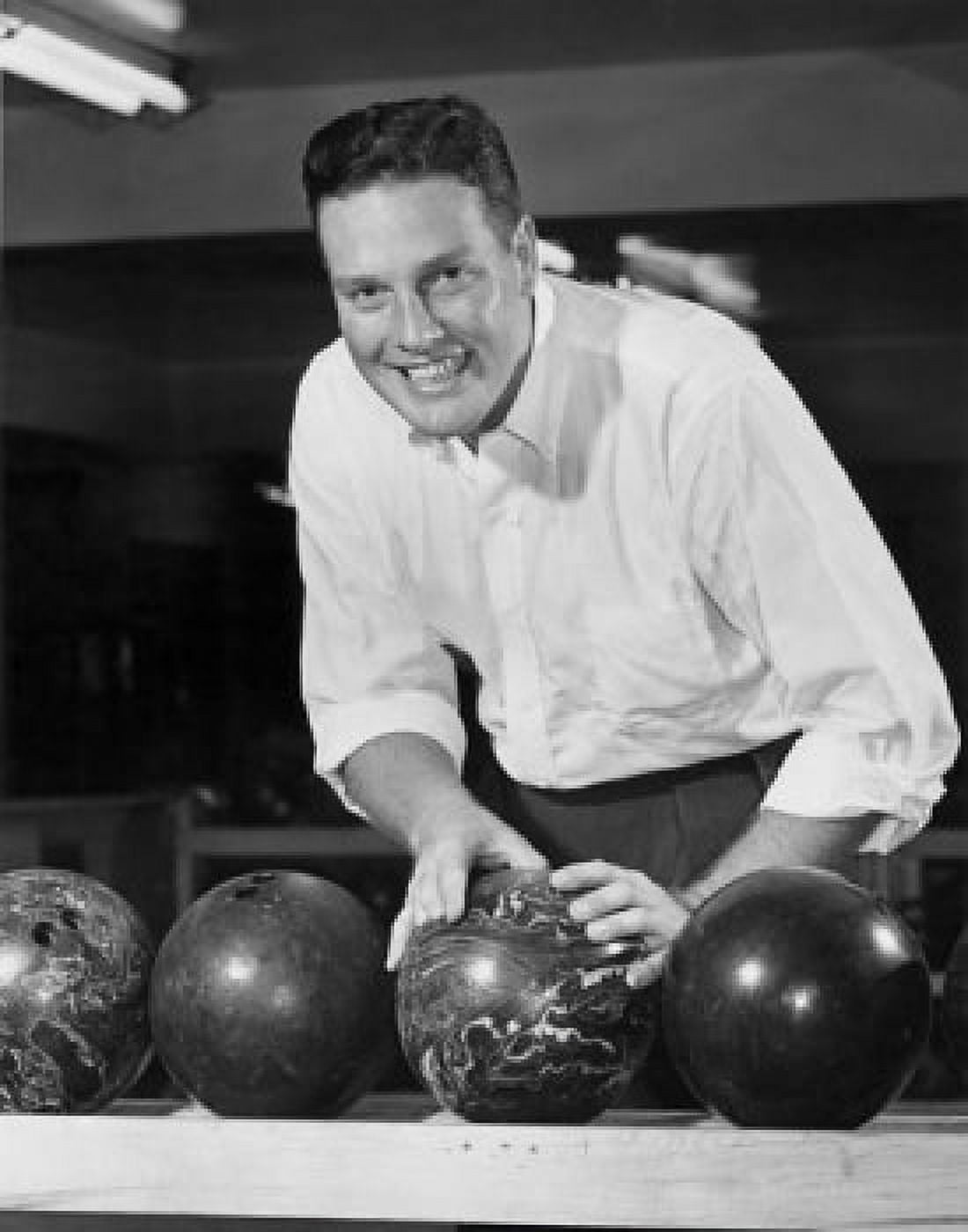 Young adult man choosing bowling ball Canvas Art - (18 x 24)