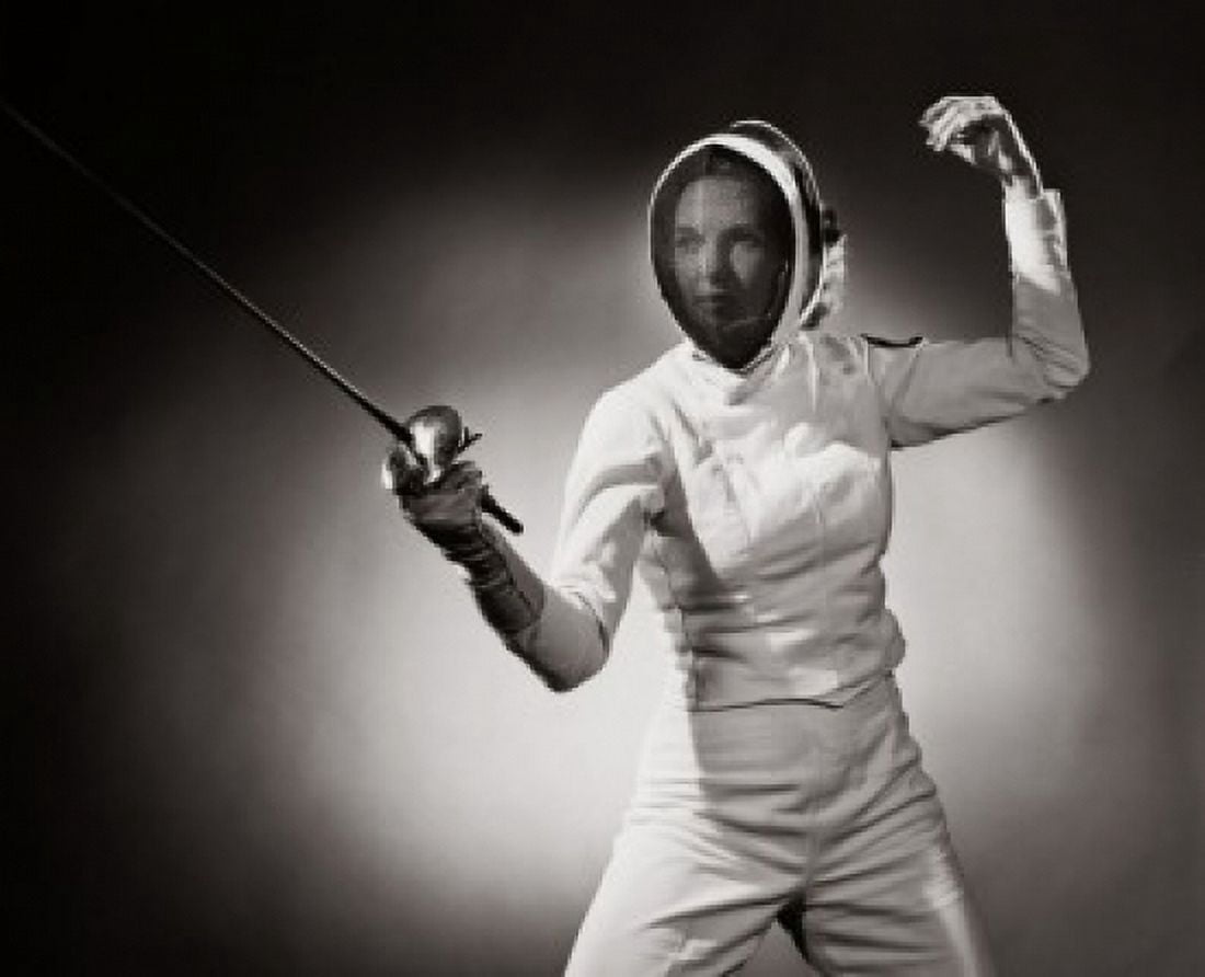 Young adult woman in a fencing stance Canvas Art - (18 x 24)
