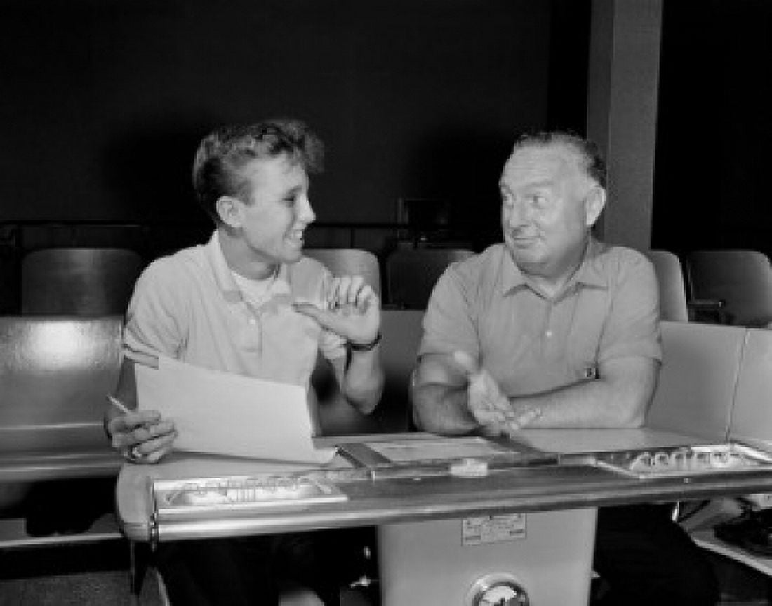 Young and senior man talking Canvas Art - (18 x 24)