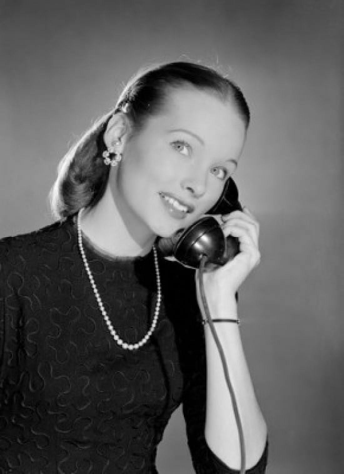 Young beautiful woman talking on phone Canvas Art - (18 x 24)