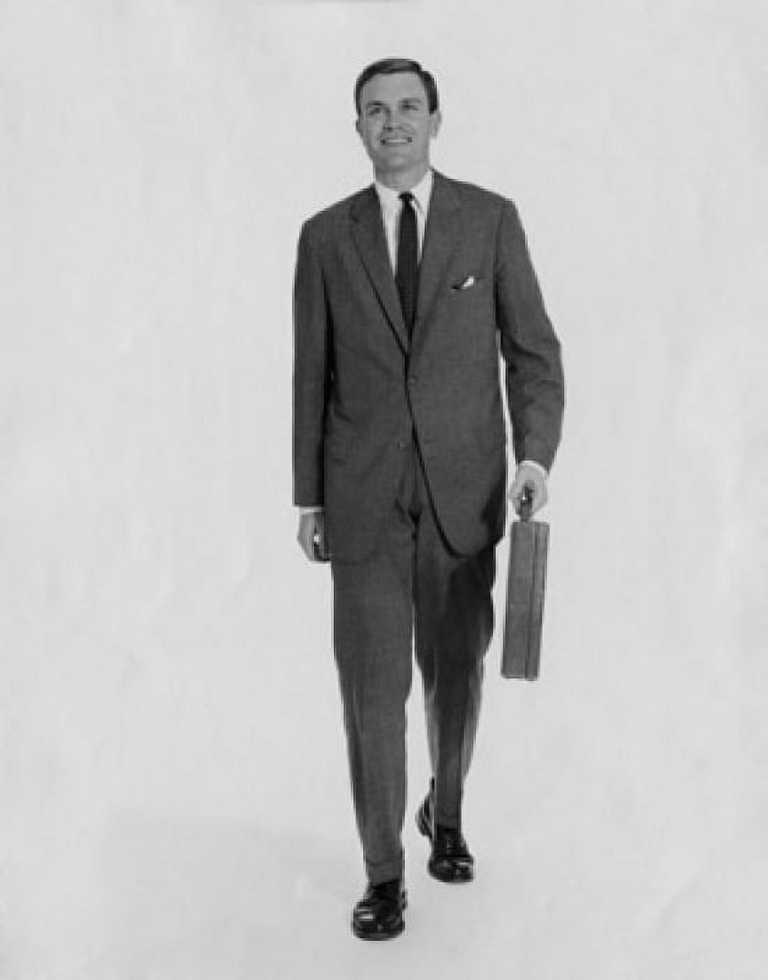 Young businessman carrying briefcase Canvas Art - (18 x 24)