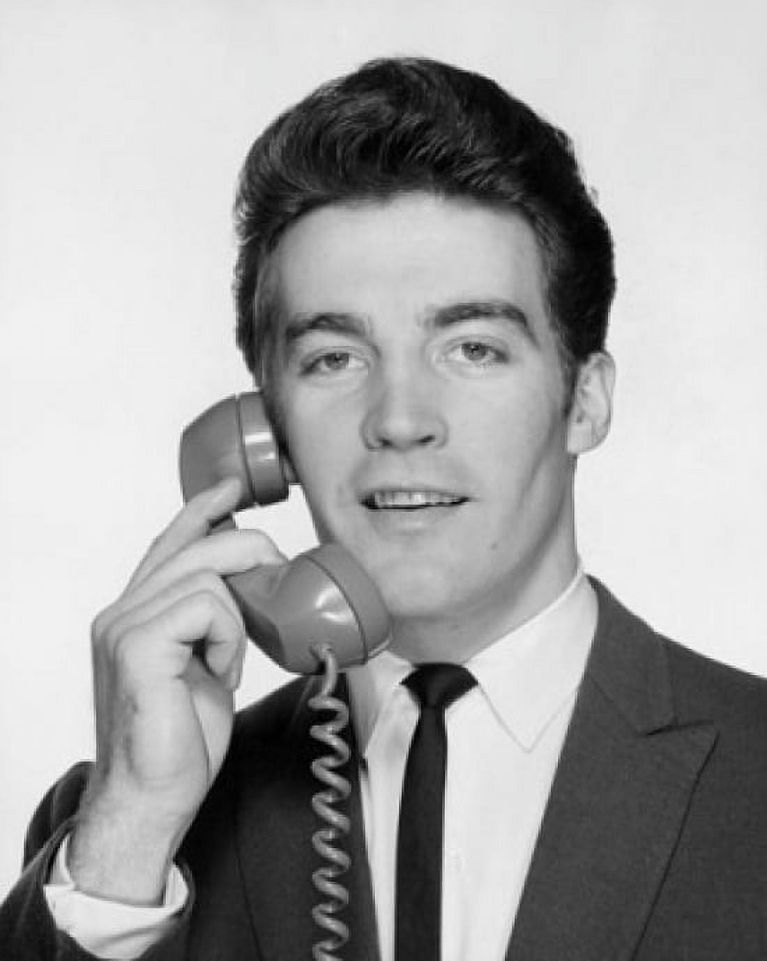 Young businessman using telephone Canvas Art - (24 x 36)