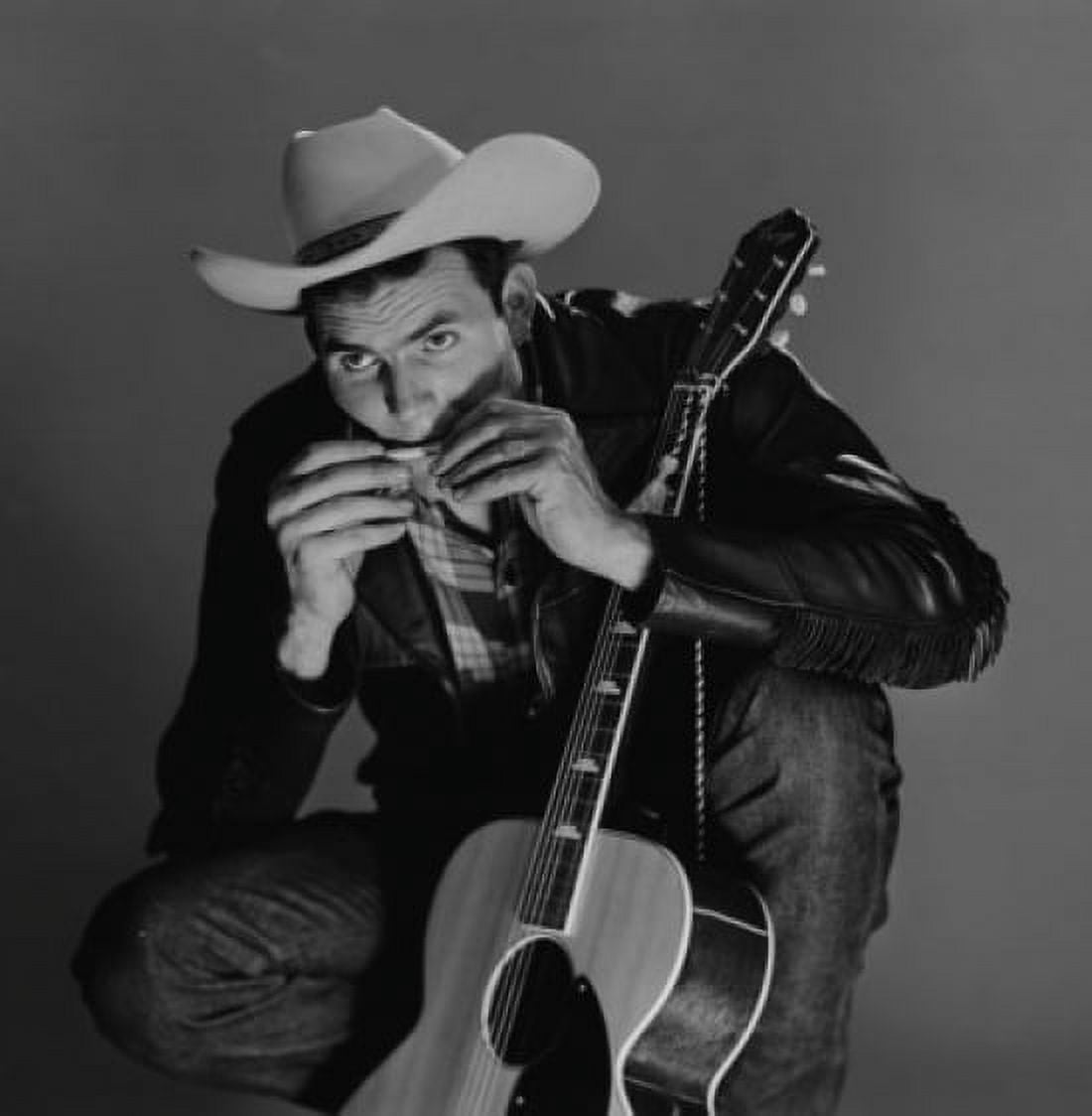 Young country musician playing harmonica Canvas Art - (24 x 36)