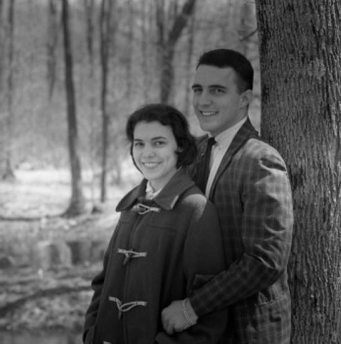 Young couple embracing in park Canvas Art -  (24 x 36)