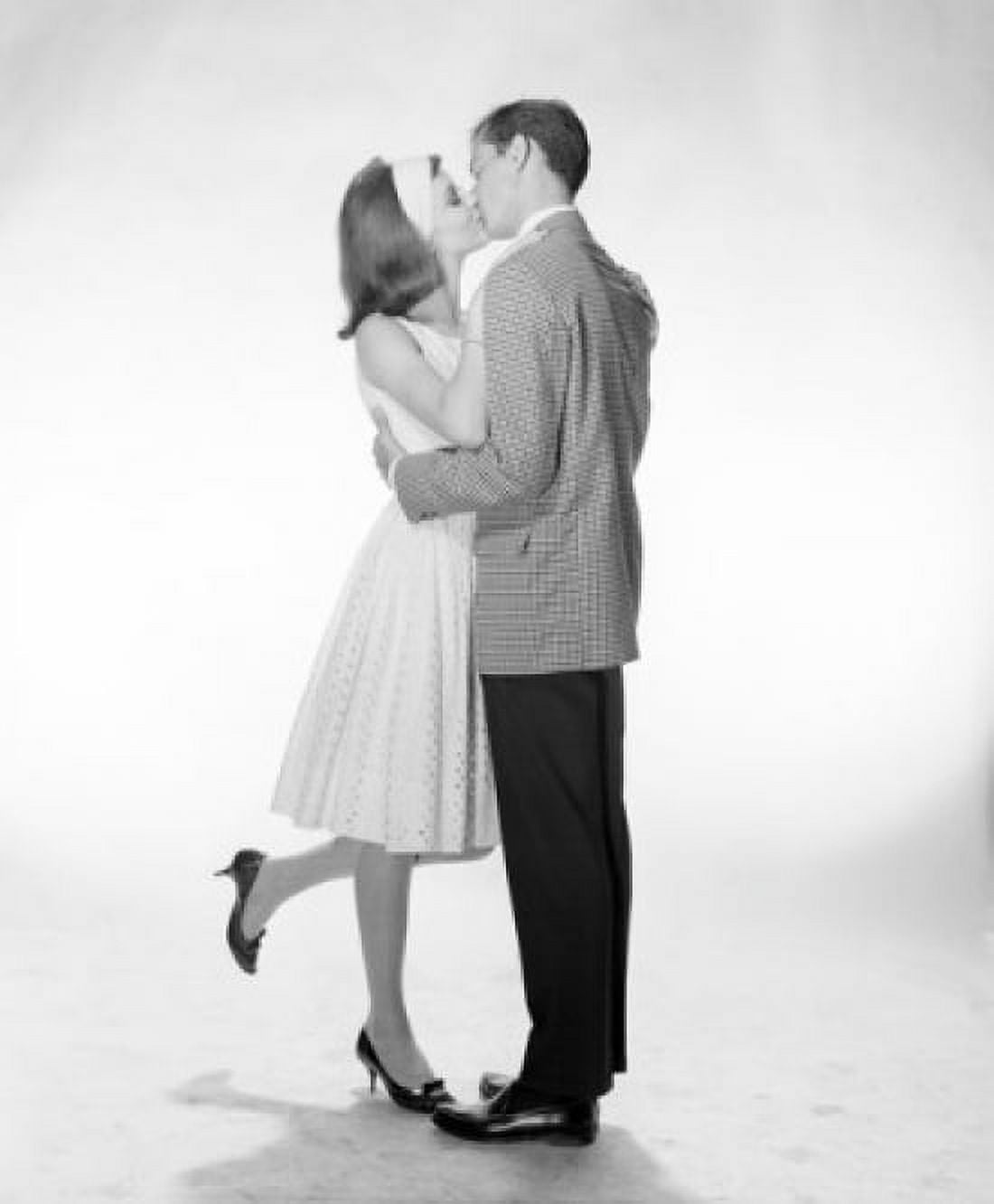 Young couple kissing Canvas Art - (24 x 36)