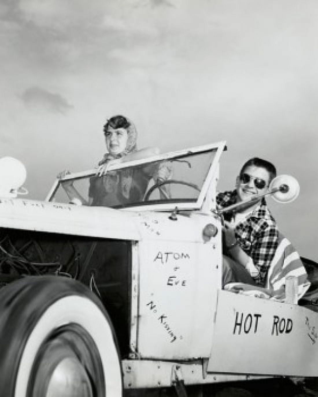 Young couple sitting in a car Canvas Art -  (24 x 36)