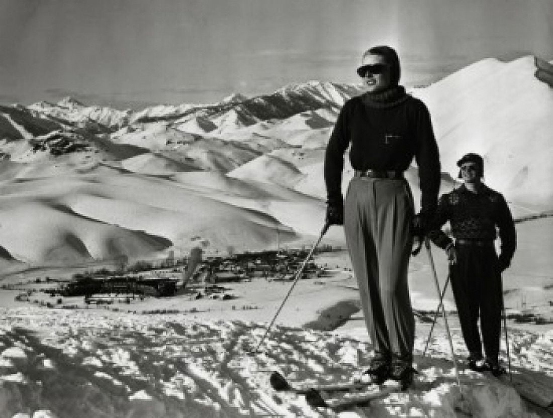 Young couple standing with skiing equipment Sawtooth Mountains Idaho USA Canvas Art - (18 x 24)