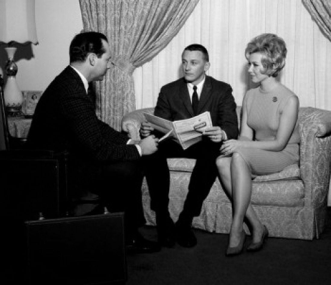 Young couple talking to insurance agent Canvas Art - (24 x 36)