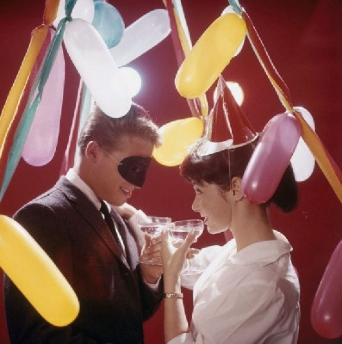 Young couple toasting with wine at New Years party Canvas Art - (24 x 36)
