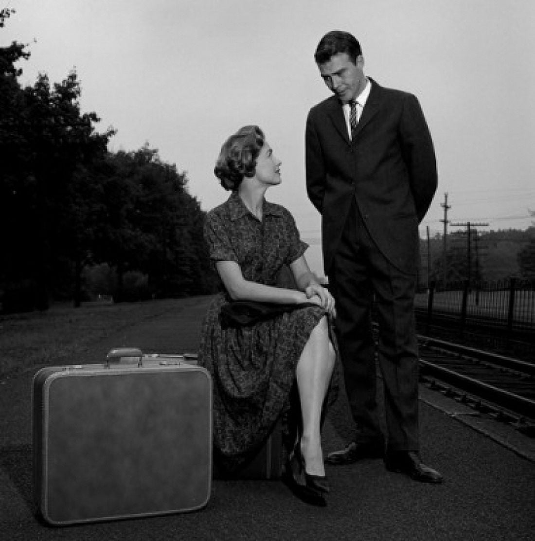Young couple waiting at train station Canvas Art - (24 x 36)