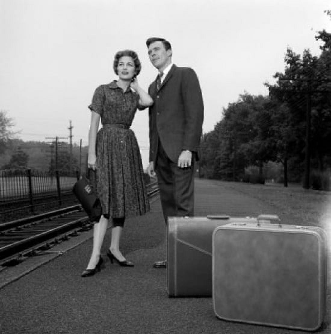 Young couple waiting for train Canvas Art - (18 x 24)