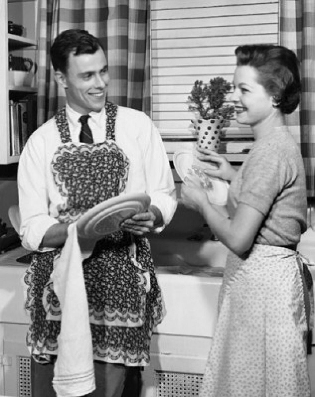 Young couple washing dishes in kitchen Canvas Art - (18 x 24)