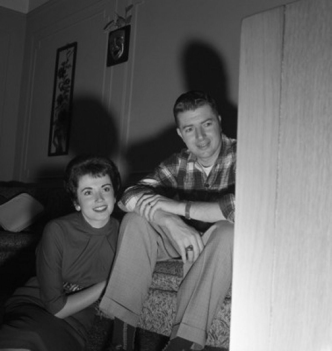 Young couple watching television Canvas Art - (18 x 24)