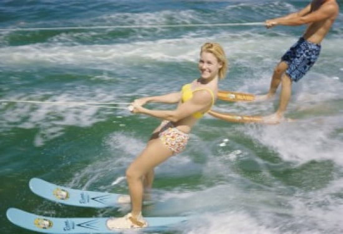 Young couple waterskiing in the sea Canvas Art - (18 x 24)