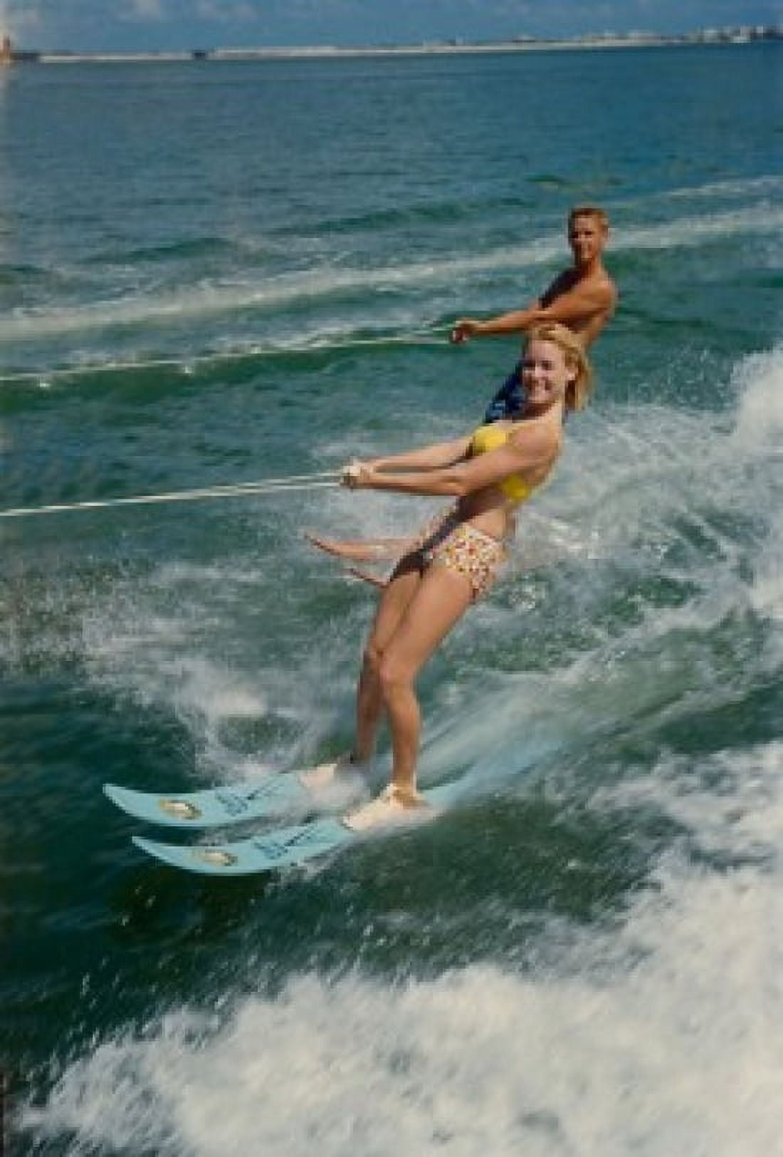Young couple waterskiing in the sea Canvas Art - (18 x 24)