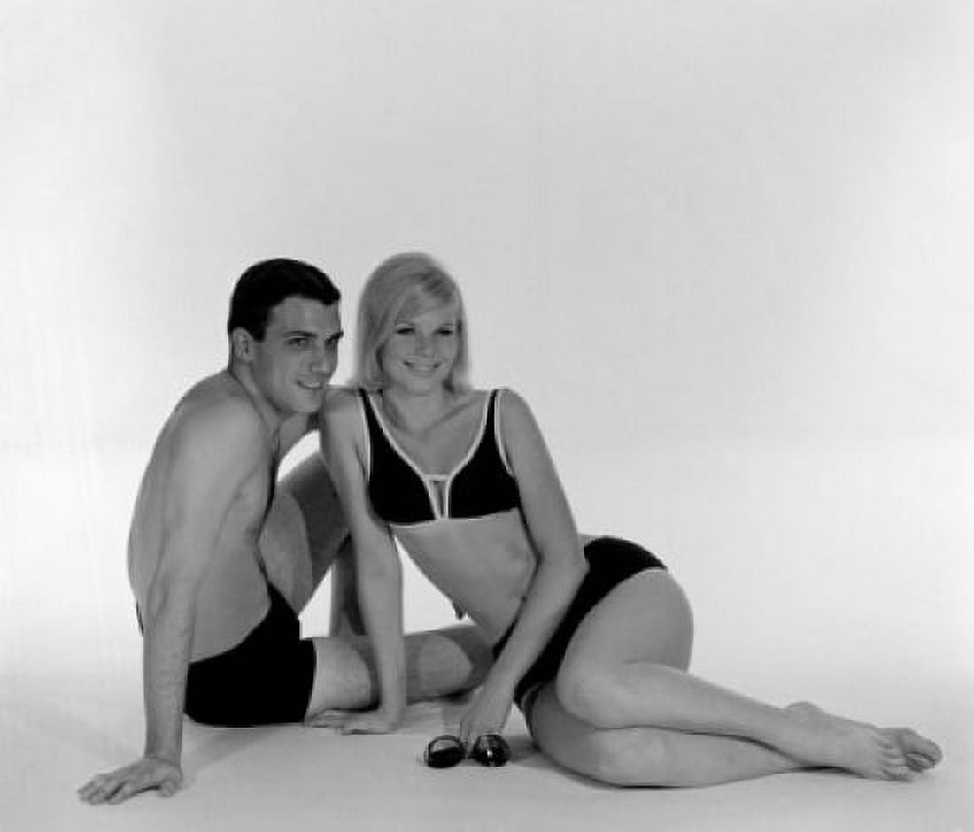 Young couple wearing swimsuits sitting on floor Canvas Art - (18 x 24)