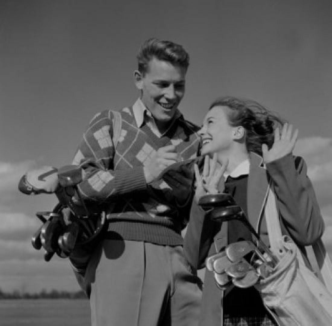 Young couple with golf clubs Canvas Art -  (24 x 36)