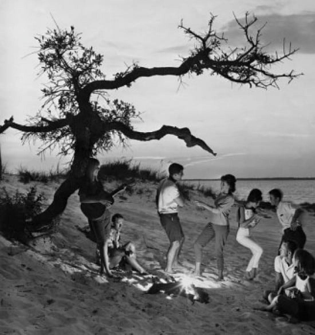 Young couples dancing on beach at sunset Canvas Art - (18 x 24)