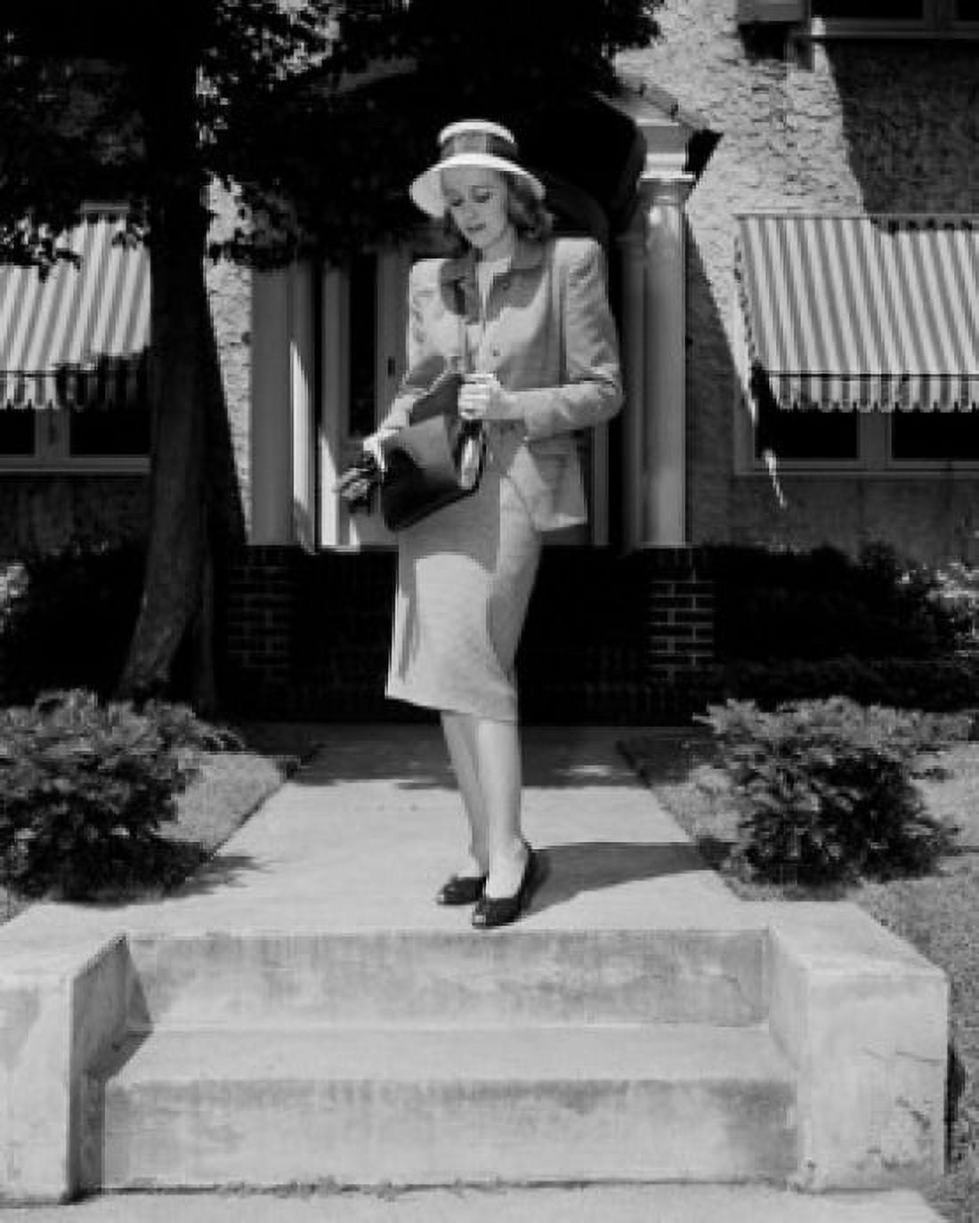 Young elegant woman standing in front of house Canvas Art - (18 x 24)