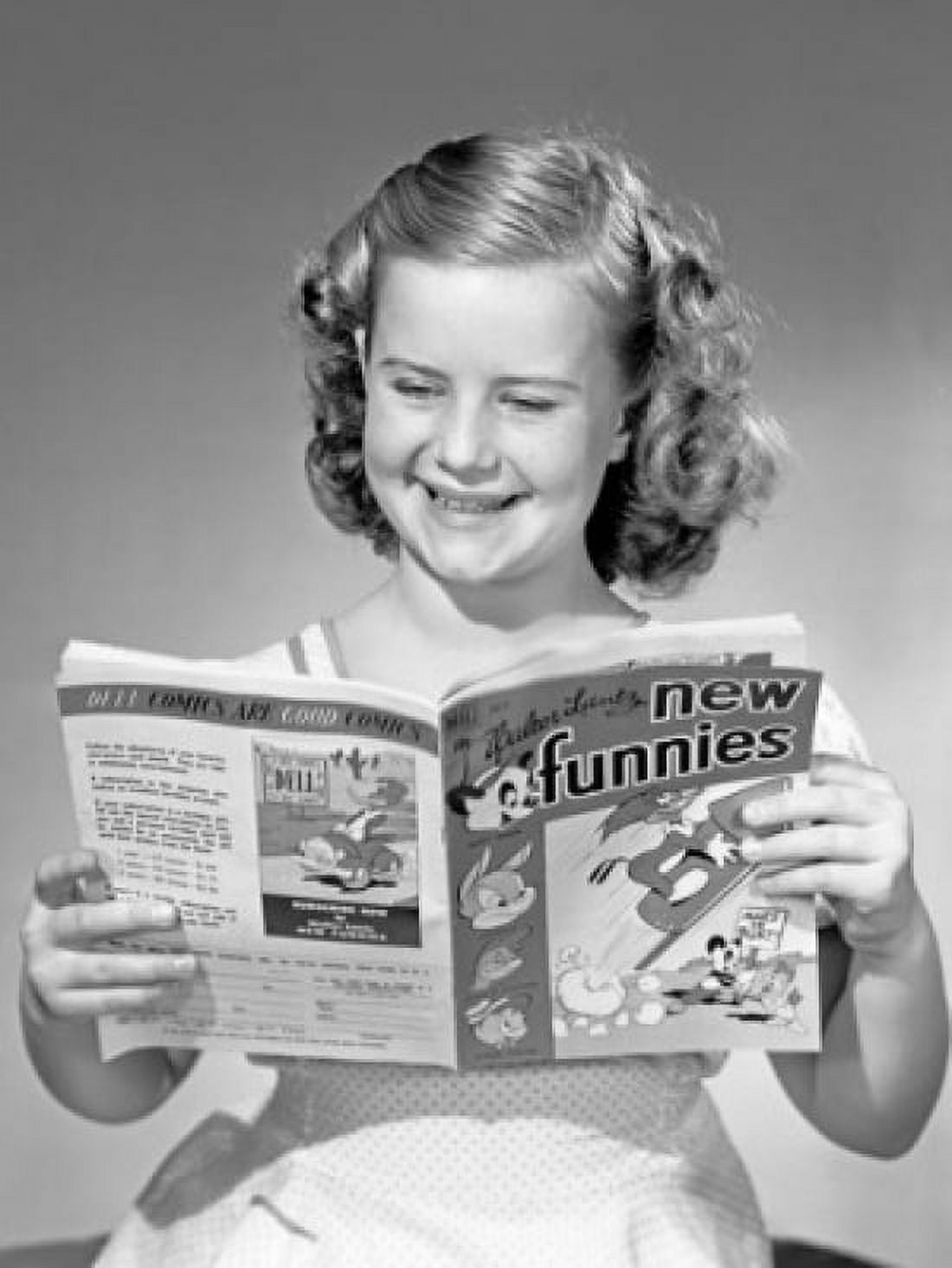 Young girl reading magazine Canvas Art - (24 x 36)