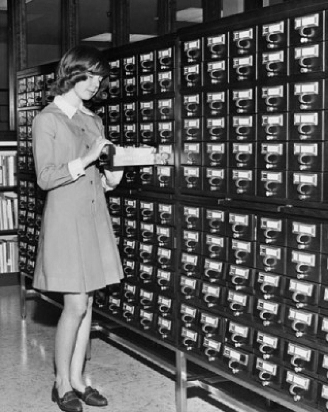 Young girl using the Library Card Catalog Canvas Art - (18 x 24)