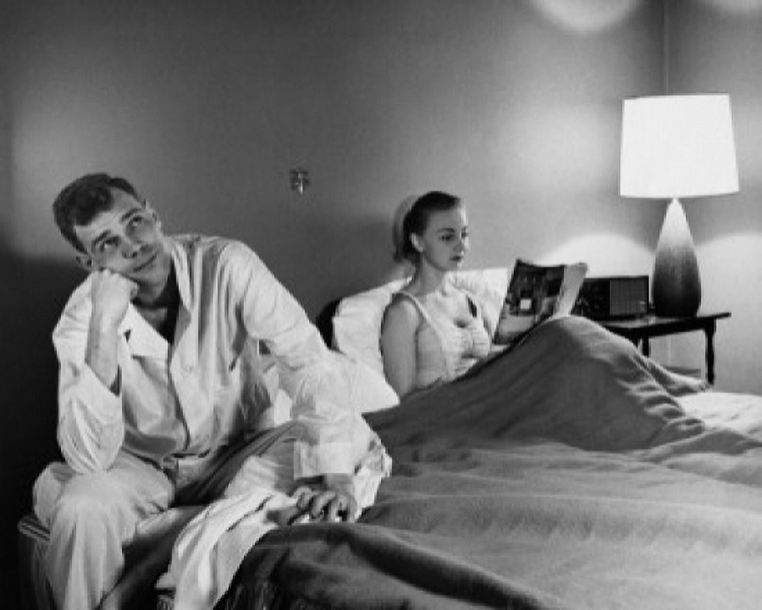 Young man and a young woman in the bedroom Canvas Art - (24 x 36)