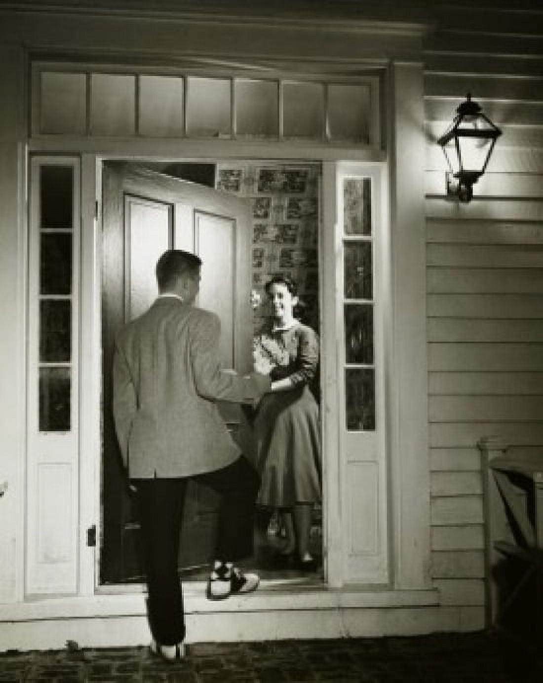 Young man arriving at the home of his date Canvas Art - (24 x 36)