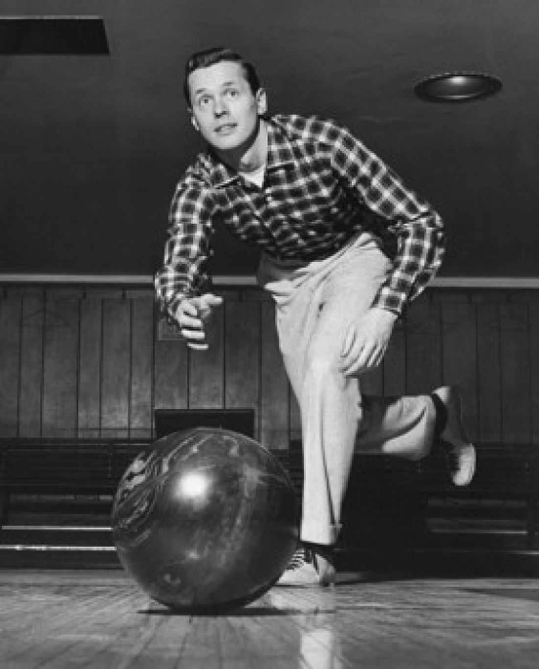 Young man bowling Canvas Art - (18 x 24)