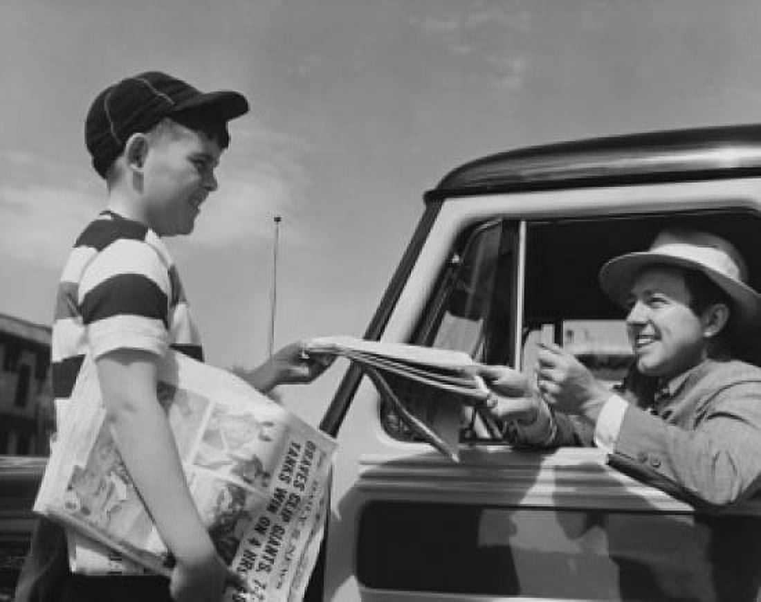 Young man buying a newspaper from a paper delivery boy Canvas Art - (18 x 24)