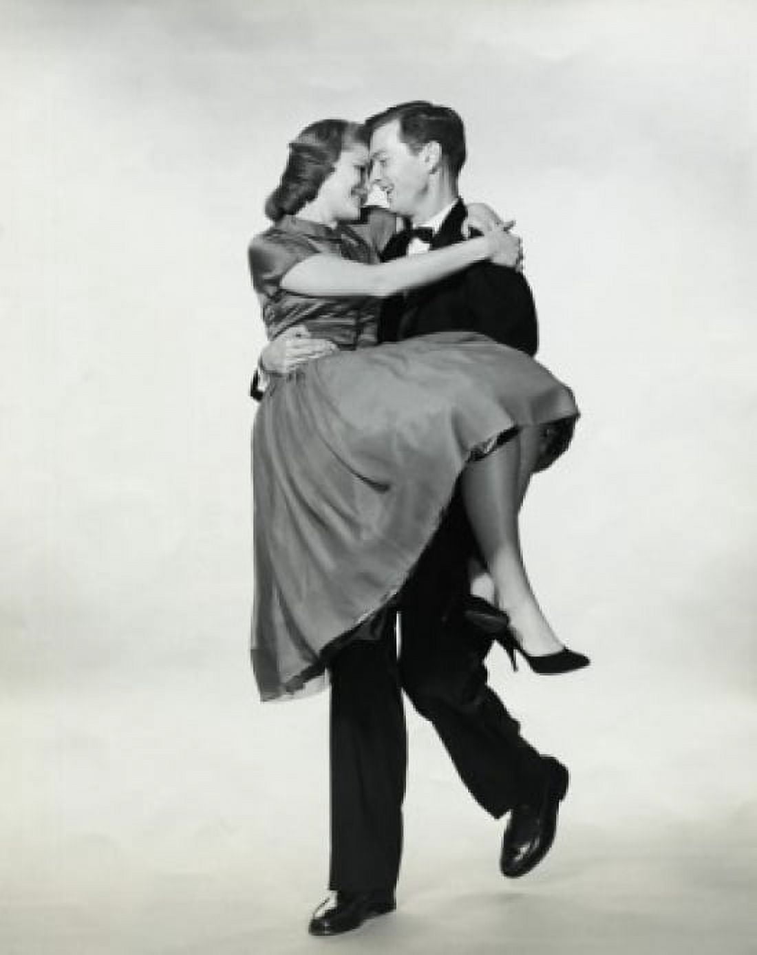 Young man carrying a young woman Canvas Art - (18 x 24)
