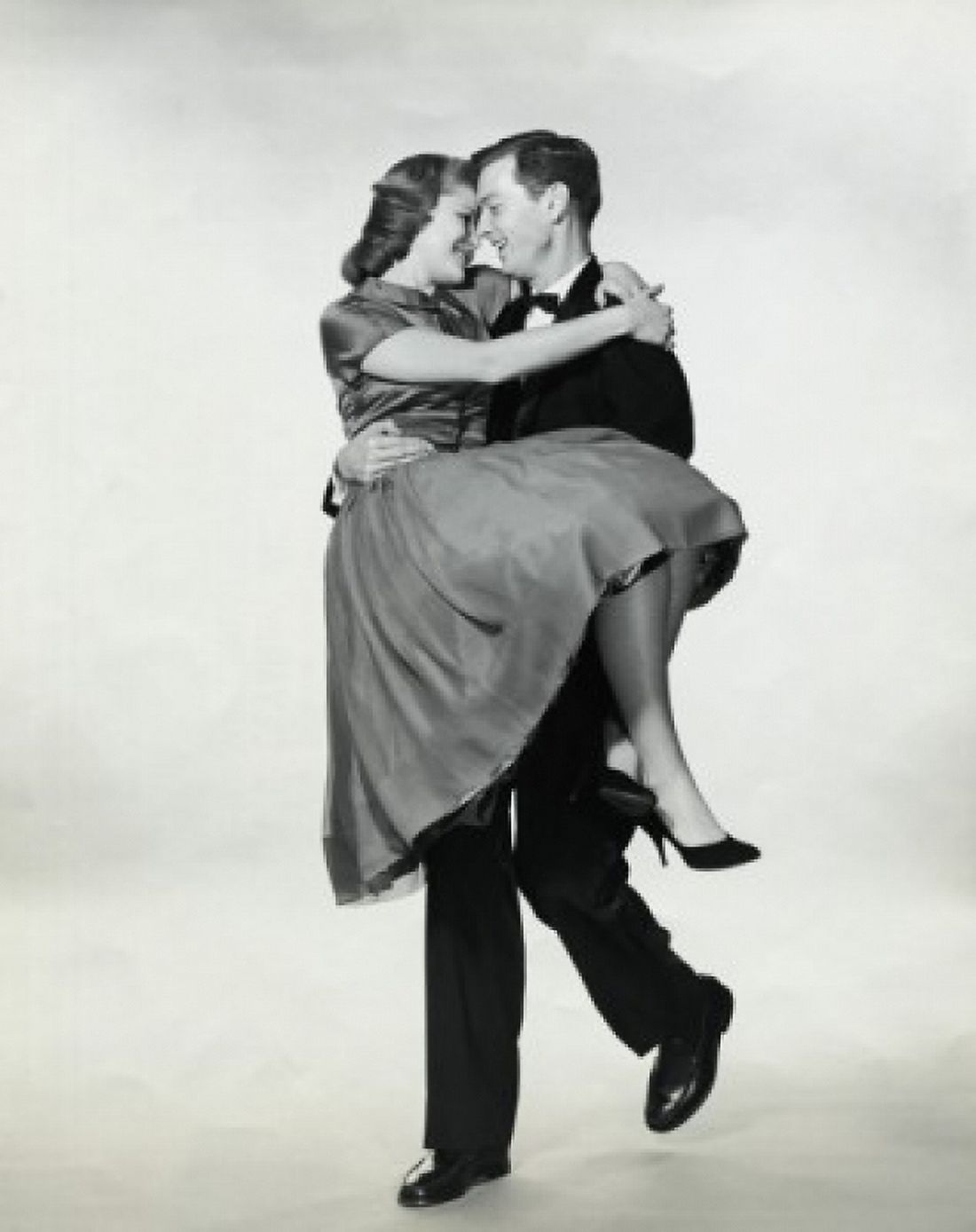 Young man carrying a young woman Canvas Art - (24 x 36)