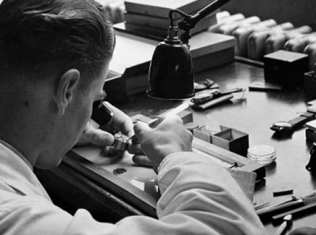 Young man examining a pocket watch Canvas Art -  (24 x 36)