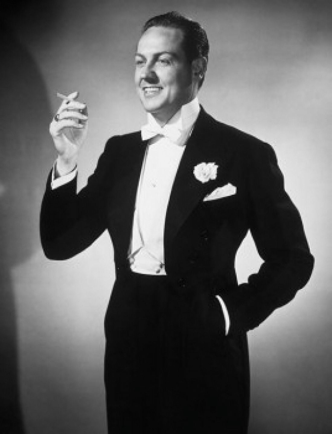 Young man in evening suit standing and holding cigarette Canvas Art - (24 x 36)