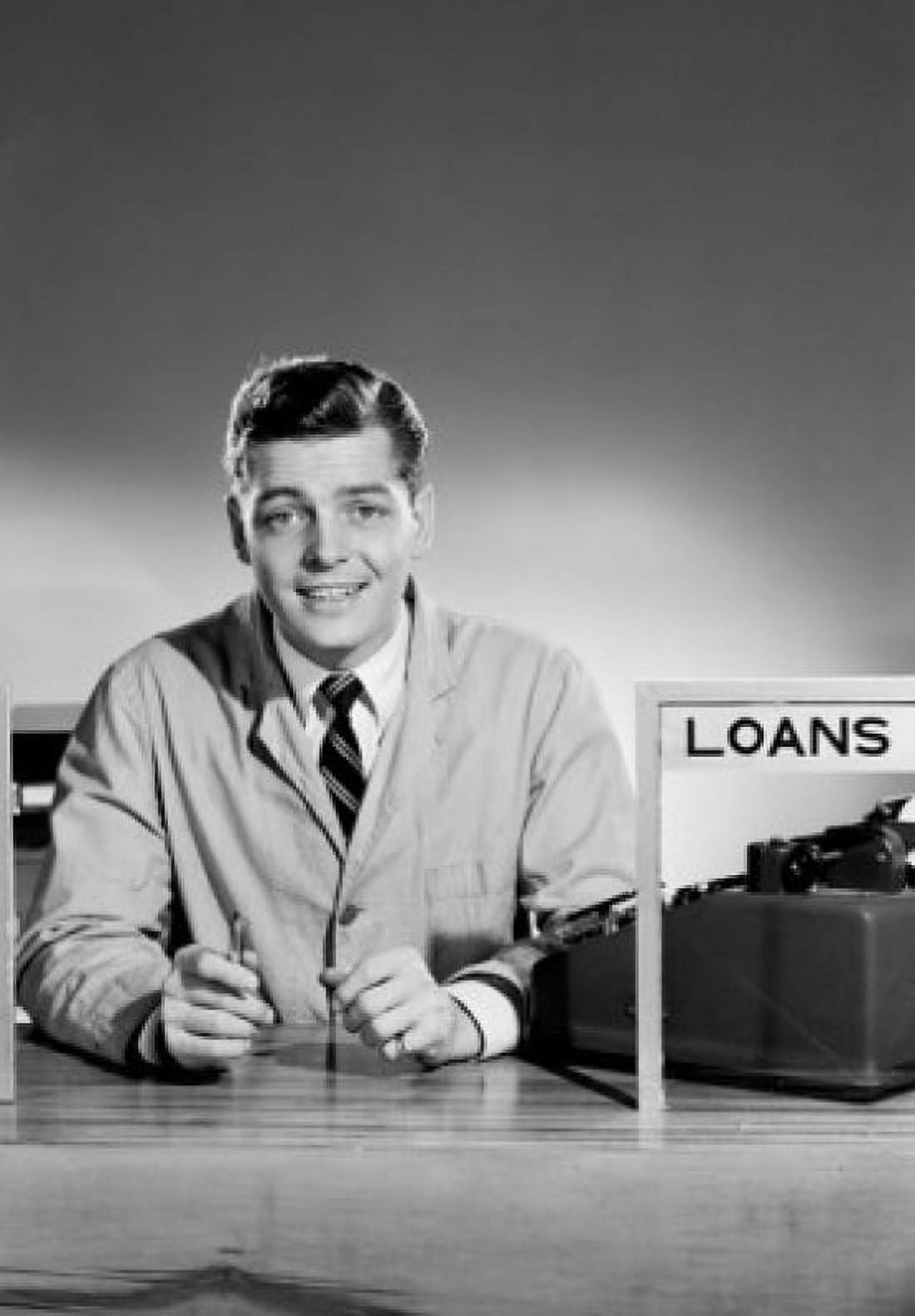 Young man in loans office Canvas Art - (24 x 36)
