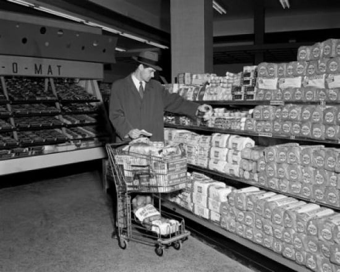 Young man in supermarket Canvas Art - (24 x 36)